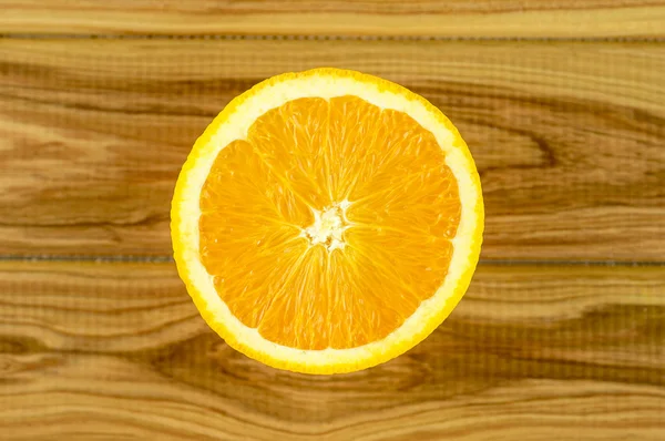 Overhead view of orange cut in half