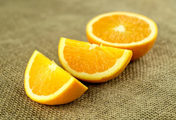 Cross sections of juicy fresh organic oranges