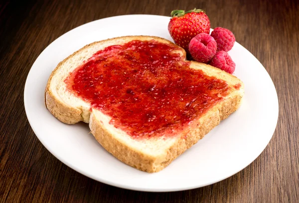 Mixed fruit jam on toast