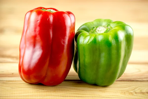 Macro closeup of organic peppers on rustic background