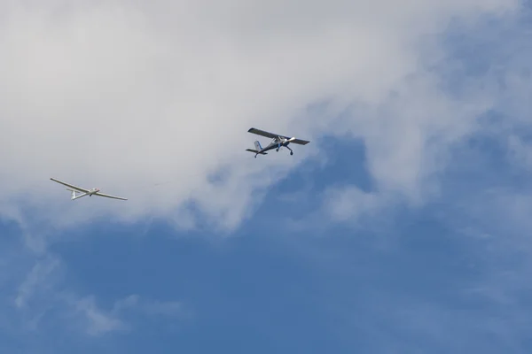 Two Gliders in Air on Connection Chain During Aviation Sport Event Dedicated to the 80th Anniversary of DOSAAF