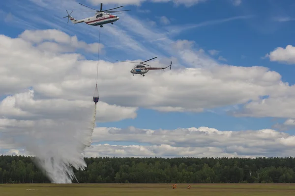 Ministry of Emergency Situations Spraying Water on MI-8MT Helicopter on Aviation Event to the 80th Anniversary of DOSAAF Foundation