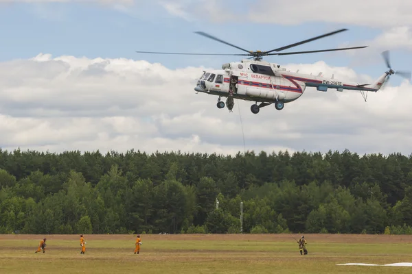 Ministry of Emergency Situations Spraying Water on MI-8MT Helicopter on Aviation Event to the 80th Anniversary of DOSAAF Foundation