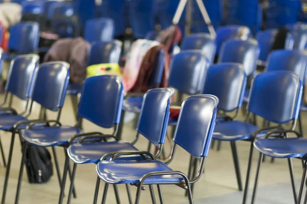 Working Empty Chairs Standing in Lines in The Conference Room.