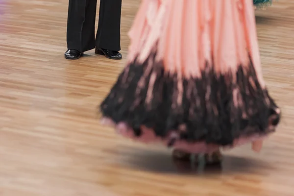 Closeup of Legs of Professional Ballroom Dance Couple Performing Youth Standard Program on National Championship of the Republic of Belarus