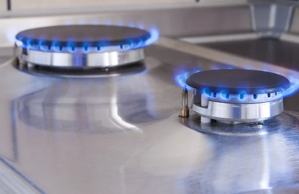 Closeup Shot of Two Gas Burners In Line Located on Kitchen Stove