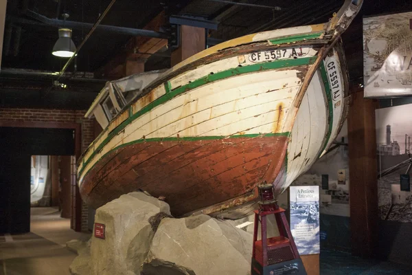San-Francisco-United States, July 13, 2014: Authentic Monterey Fishing Boat Little Rose Beached on The Rocks on Stand in Maritime Museum in San-Francisco on July 13, 2014 in San-Francisco