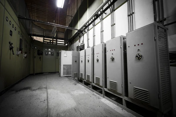 Electrical switchboards in an abandoned factory