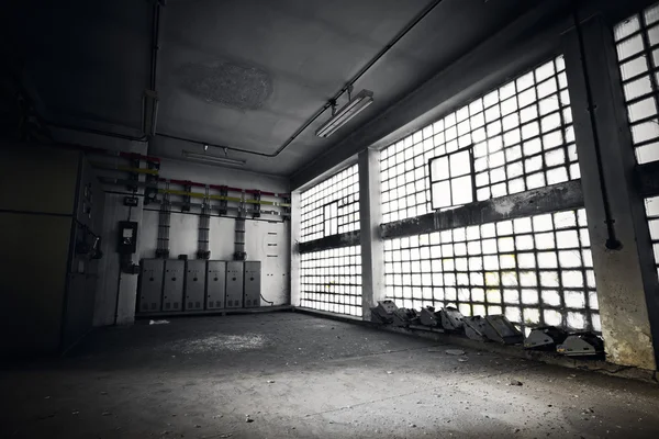 Electrical switchboards in an abandoned factory
