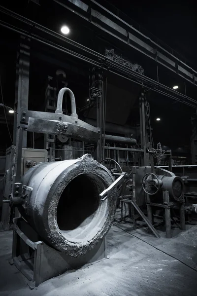 A foundry furnace with an empty tank