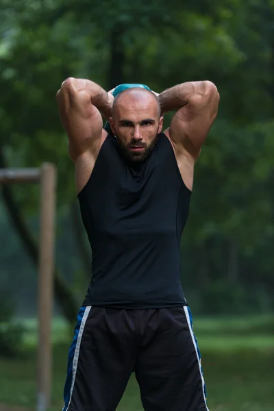 Man During Workout With Kettlebell