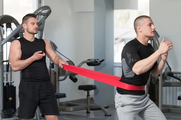 Couple Train Together With Resistance Bands