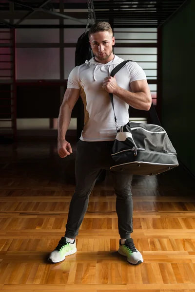 Young Man with gym bag
