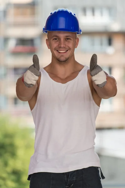 Happy Caucasian Construction Worker Giving Thumb Up