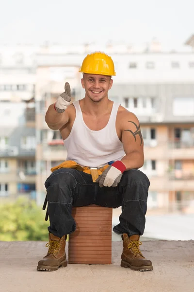 Smiling Contractor Showing Thumb Up