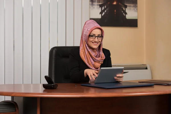 Muslim Woman Working On Computer In Office