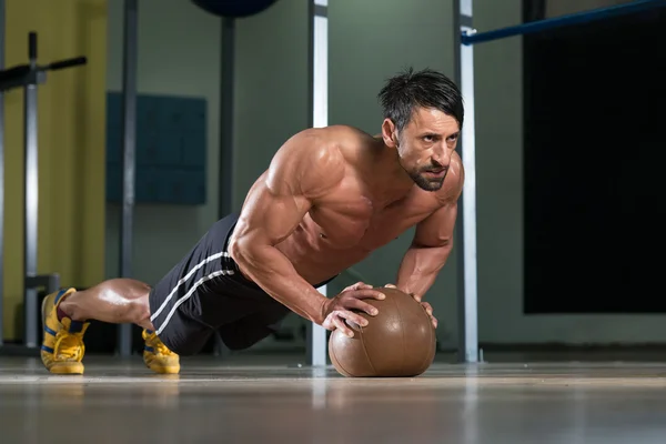 Push-Ups On Medicine Ball