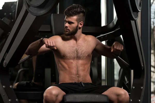 Handsome Man Doing Heavy Weight Exercise For Chest