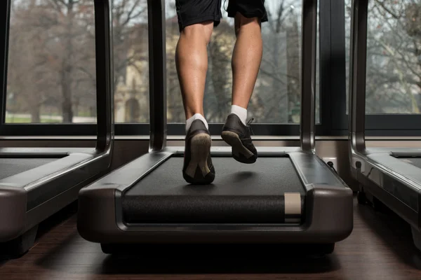 Man Feet On Treadmill