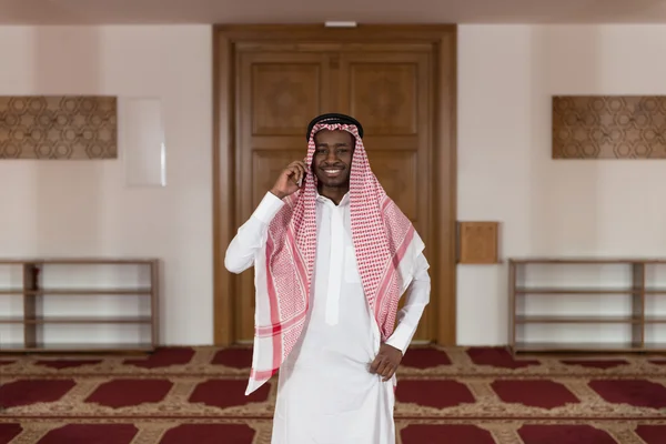 Arab Saudi Emirates Man Using A Smart Phone