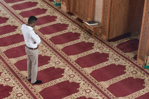 African Muslim Praying In Mosque