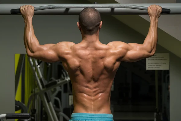 Male Athlete Doing Pull Ups