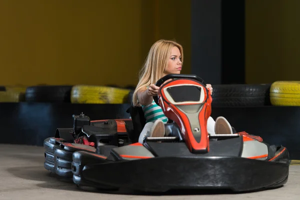 Young Woman Driving Go-Kart Karting Race