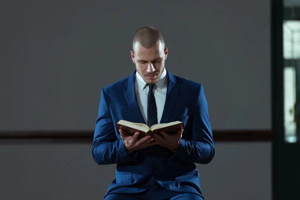 Muslim Businessman Reading Holy Islamic Book Koran