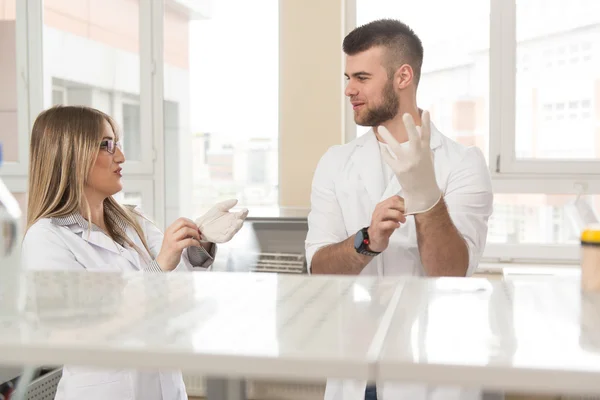 Young People Couple In Bright Modern Lab