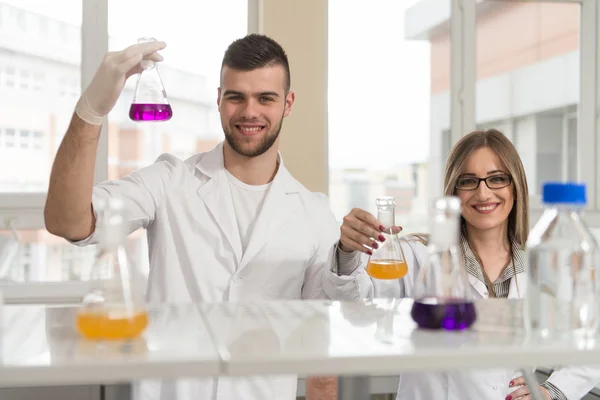 Young People Couple In Bright Modern Lab