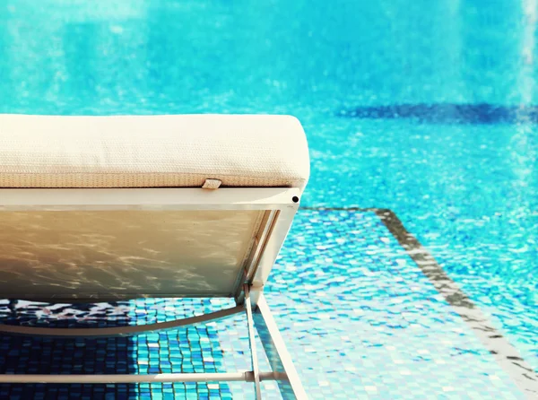 Chair side swimming pool