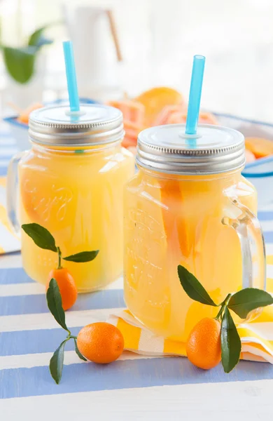 Orange juice in vintage jars