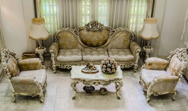 Upper angle of a living room with luxurious and classical haunting style furniture