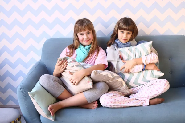 Teen girls on pajama party with pillows