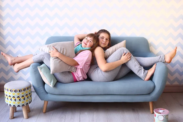 Teen girls on pajama party with pillows