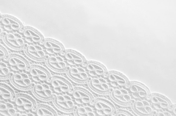 Smooth elegant white silk background. Elegant white background with lace and silk