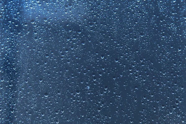Raindrops on glass background