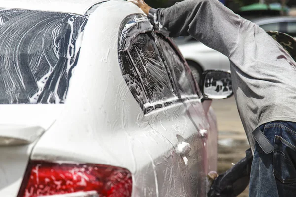 Washing a car at car wash service