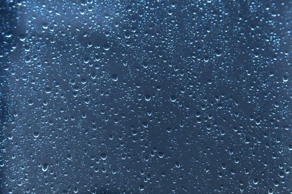 Raindrops on glass Background texture
