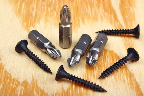Steel screwdriver tips and screw