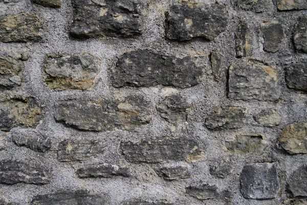 Ancient dark gray stone fortress wall