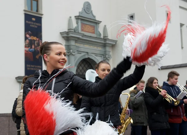 VILNIUS, LITHUANIA-MARCH 7: Unidentified peoples parade and young dancers in annual traditional crafts fair - Kaziuko fair on Mar 7, 2015 in Vilnius, Lithuania. Young girls dancing in concert.