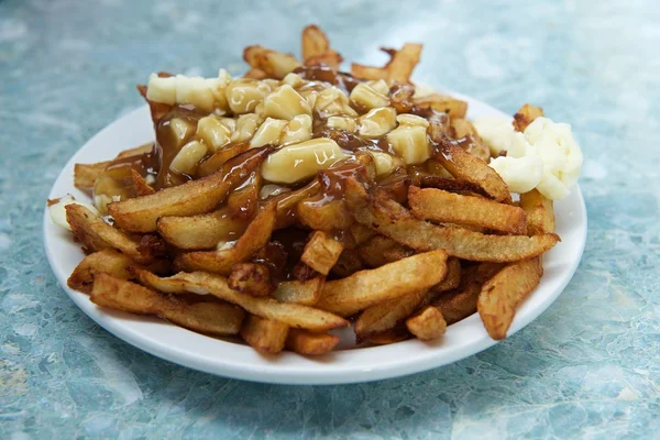 Poutine - traditional canadian dish popular in Quebec province, fast food