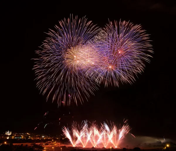 Colourful fireworks explosion in Zurrieq, Malta. Fest St.Catharina in Malta. Victory day. Independence day. Fireworks festival