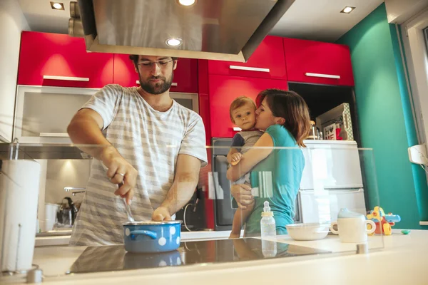 Lovely Family In Kitchen