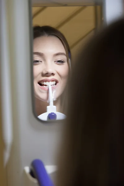 Young Woman Having Panoramic Digital X-ray Of Her Teeth