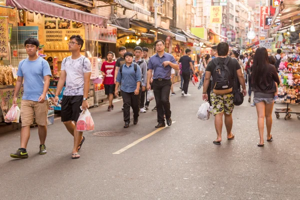 Shoppers at Danshui Pedestrian shopping area