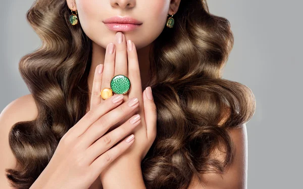 Fashion woman with rings on fingers