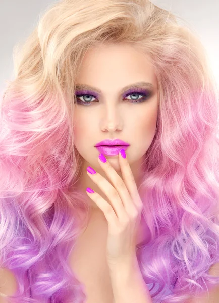 Beautiful  woman with  colorful hair