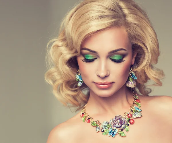 Beautiful blond woman with jewelry